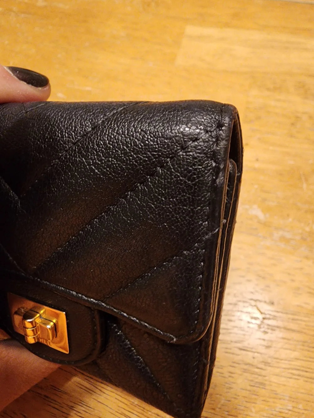 black quilted leather Chanel 2.55 Reissue compact wallet